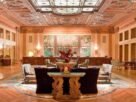 The stunning interior of the Millennium Biltmore Hotel, showcasing its elegant architecture and festive decorations.
